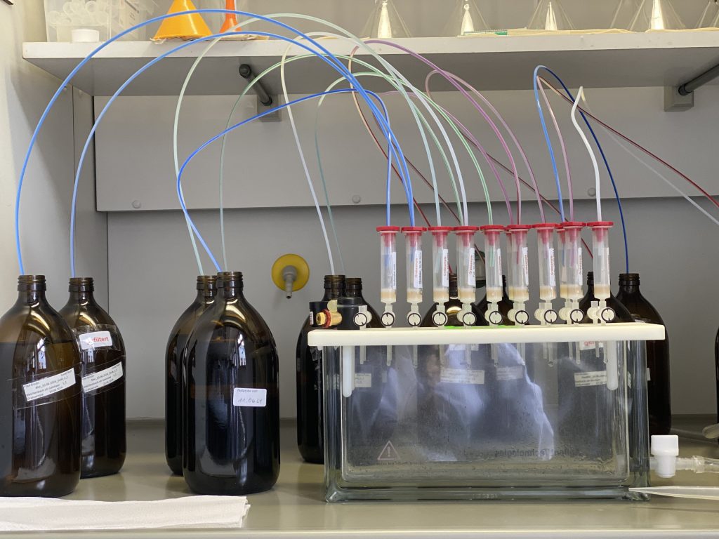 Lab work: Transferring the pollutants out of water samples onto cartridges, which are then sent to an external lab 